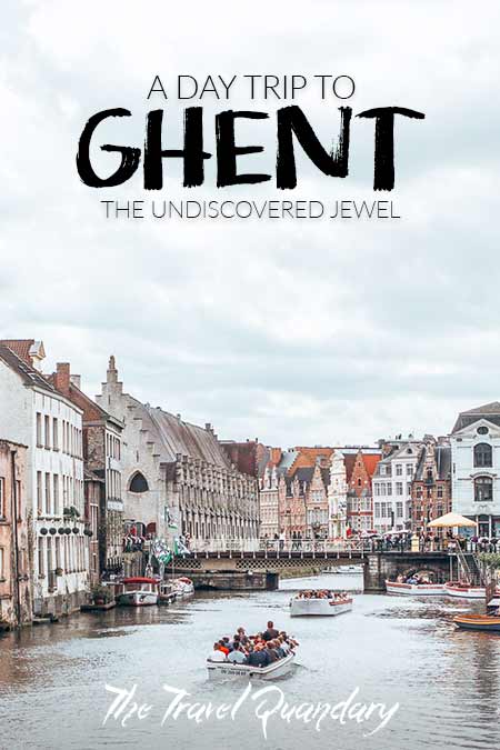 The Undiscovered Flemish Jewel A Day Trip to Ghent2 Boats cruise along the canal on a cloudy day in Ghent, Belgium