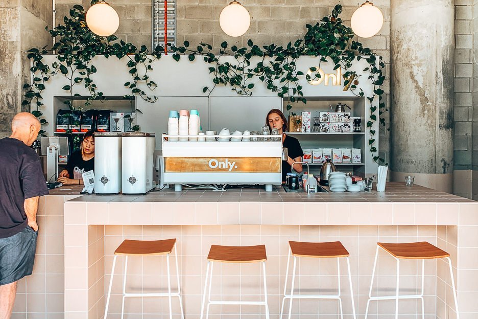 Baristas serving specialty coffee at Only Specialty Coffee, Brisbane CBD