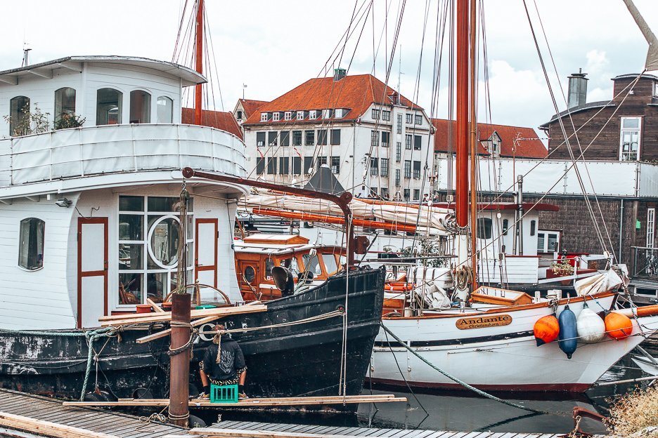 Boats moored in Nyhavn - Copenhagen City Guide, Denmark