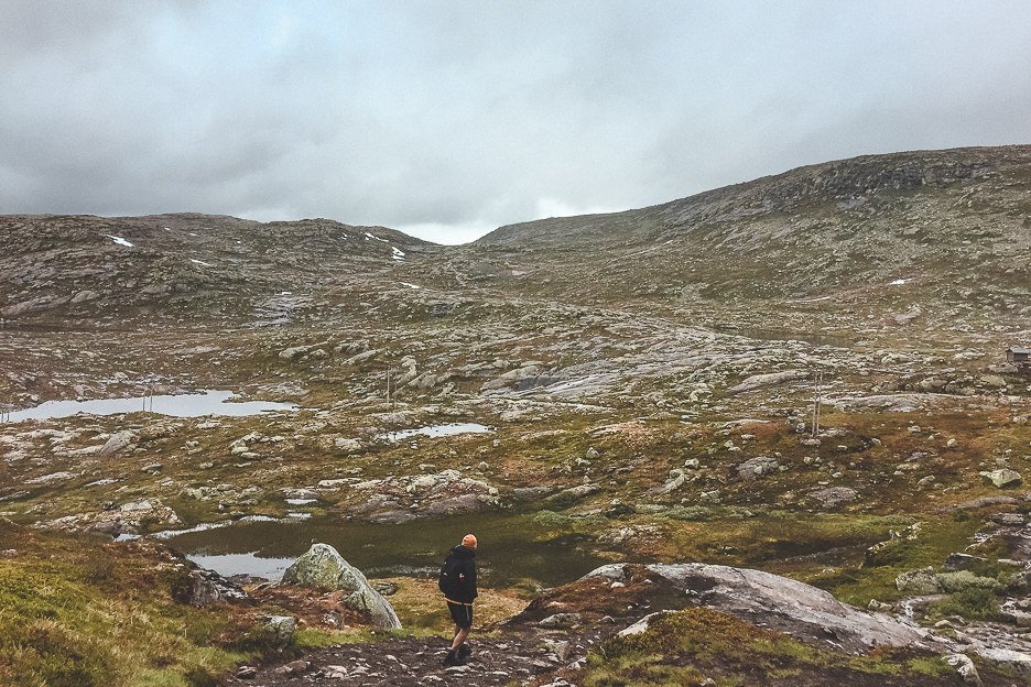 Bevan hiking amongst rugged landscapes - Trolltunga, Norway