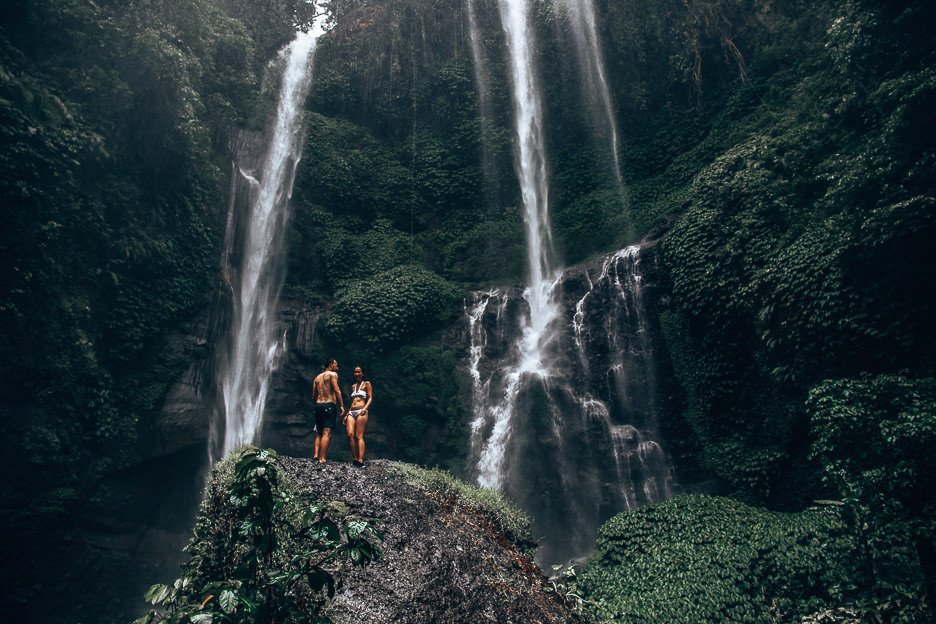 25 Incredible Photos Of Bali To Spark Your Wanderlust 7 L Standing under Sempulkul Waterfall, Bali Gallery