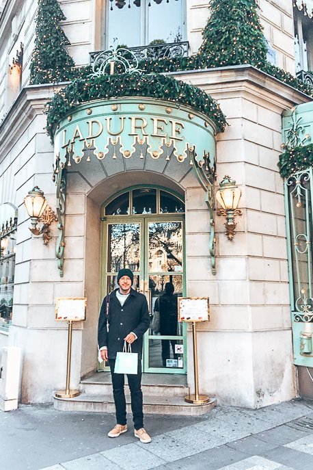 Walking out with treats from La Duree, Patisserie in Paris