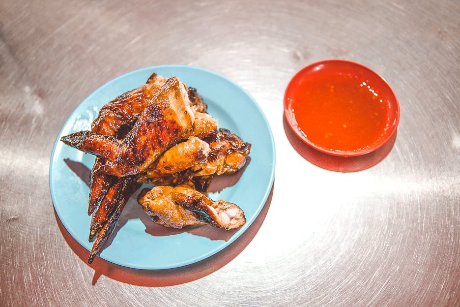 A plate of 6 chicken wings with chilli sauce at Wong Ah Wah