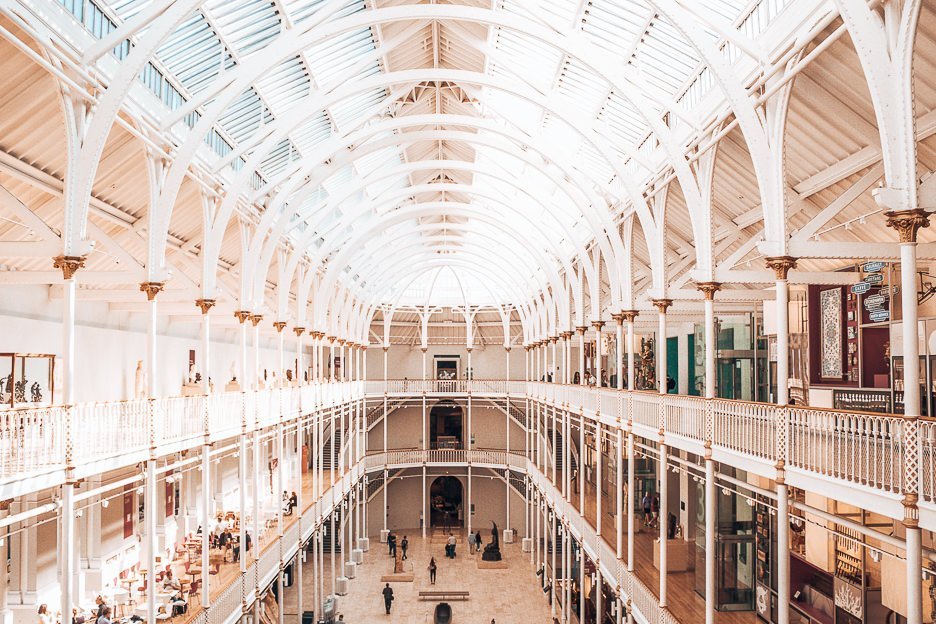 Sunlight streams through the white arches of the National Museum of Scotland, Edinburgh