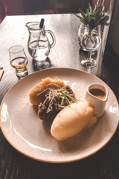 Eating in Europe 18 Must Try Traditional Foods 12 P Potato, haggis and gravy at the Whiski Rooms, Edinburgh