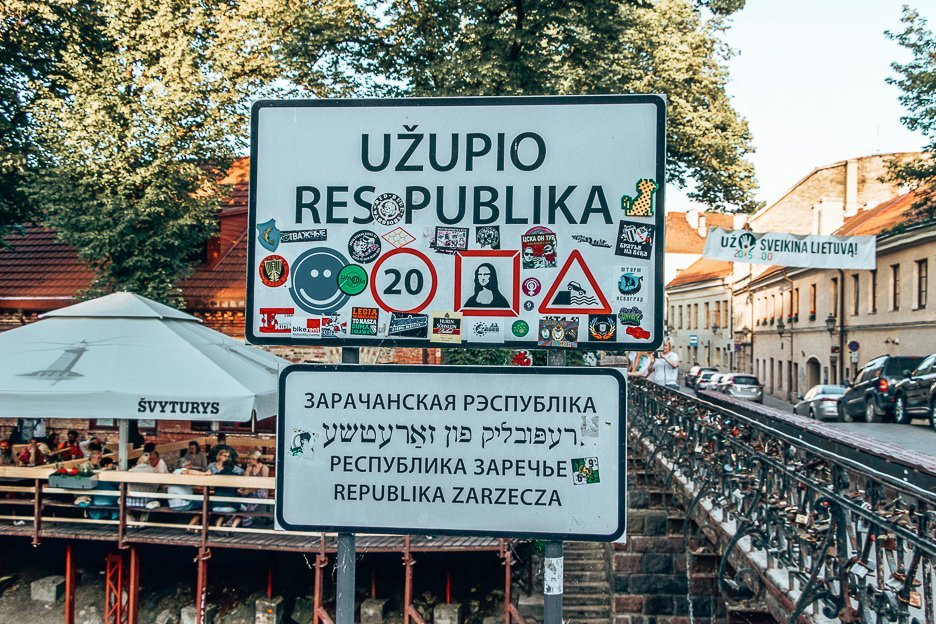 The entrance to Uzupio Respublika covered in stickers, Vilnius