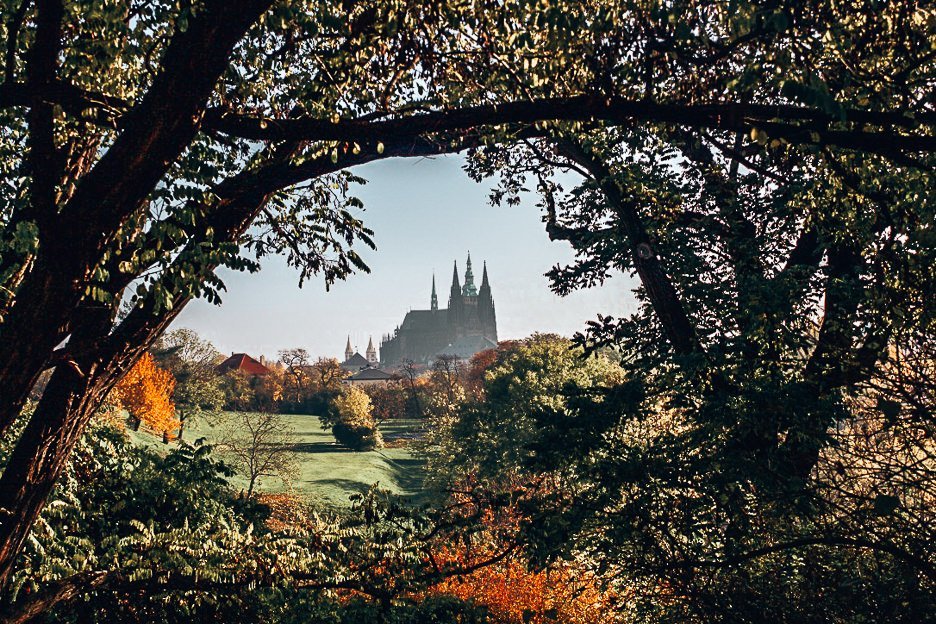 How To See Prague In 2 Days 5 L Prague Castle through the trees, Prague