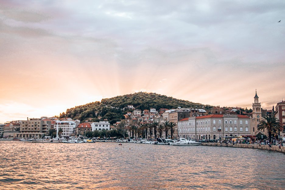 Sunset over the hill from Riva harbourfront, Split Croatia