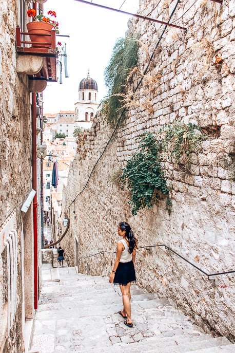 How To Spend 48 Hours In Dubrovnik 5 P Jasmine on top of a stairway in Dubrovnik Old Town - Croatia