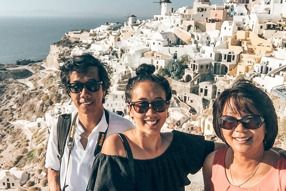 Jasmine with her parents in Oia, Santorini, Greece