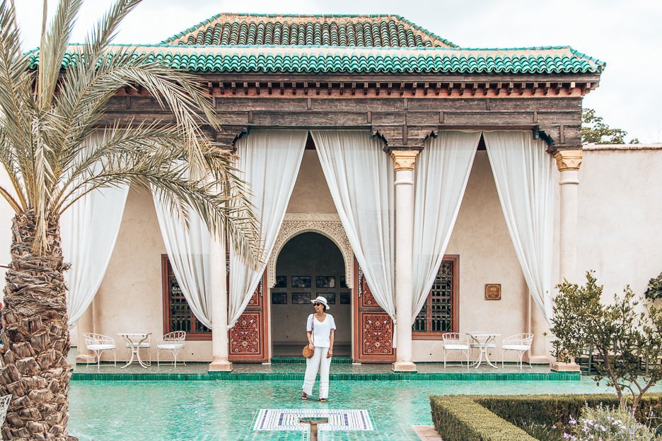 Morocco Travel Photography 35 Photos To Inspire You To Visit 16 L Jasmine stands on green tiles in between the white curtains of le Jardin Secret, Marrakech, Morocco