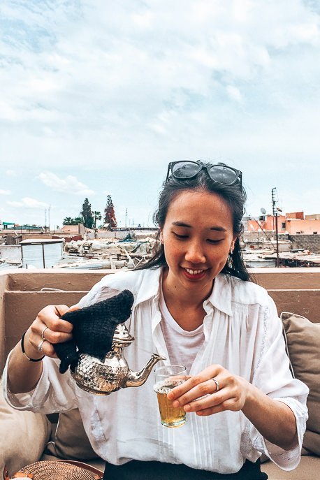 Morocco Travel Photography 35 Photos To Inspire You To Visit 9 P Pouring mint tea at NOMAD cafe Marrakech Morocco