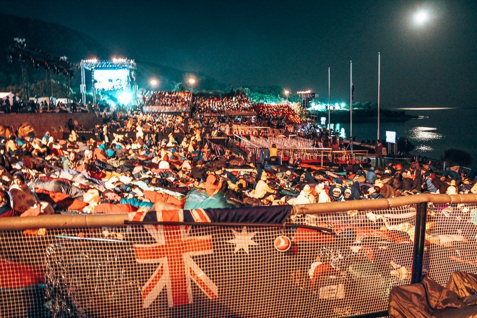 Visitors to Gallipoli sit through the night waiting for dawn