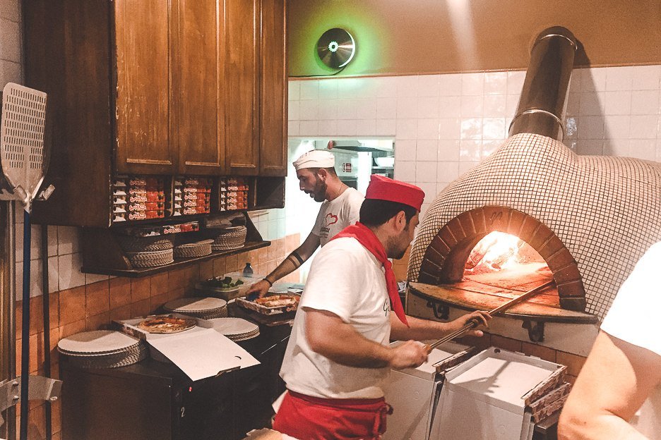 Chefs hard at work at Gusto Pizza, Florence