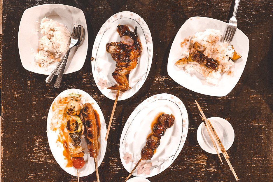 Roast chicken, Hungarian sausage, chorizo and rice at Mama's Grill, Siargao