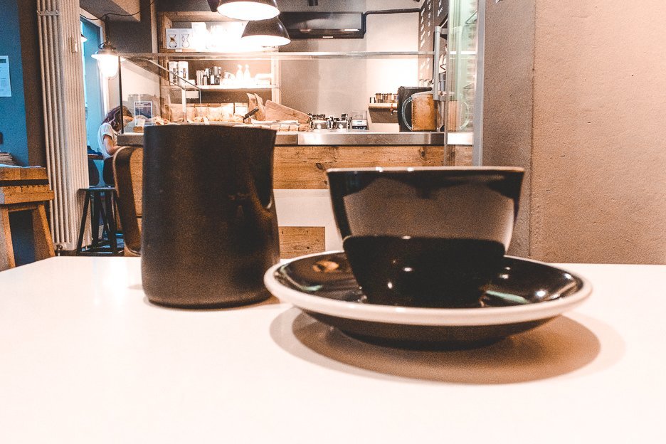 The Alternative Berlin City Guide 13 L Filter coffee in black cup and saucer at The Barn, Berlin Germany