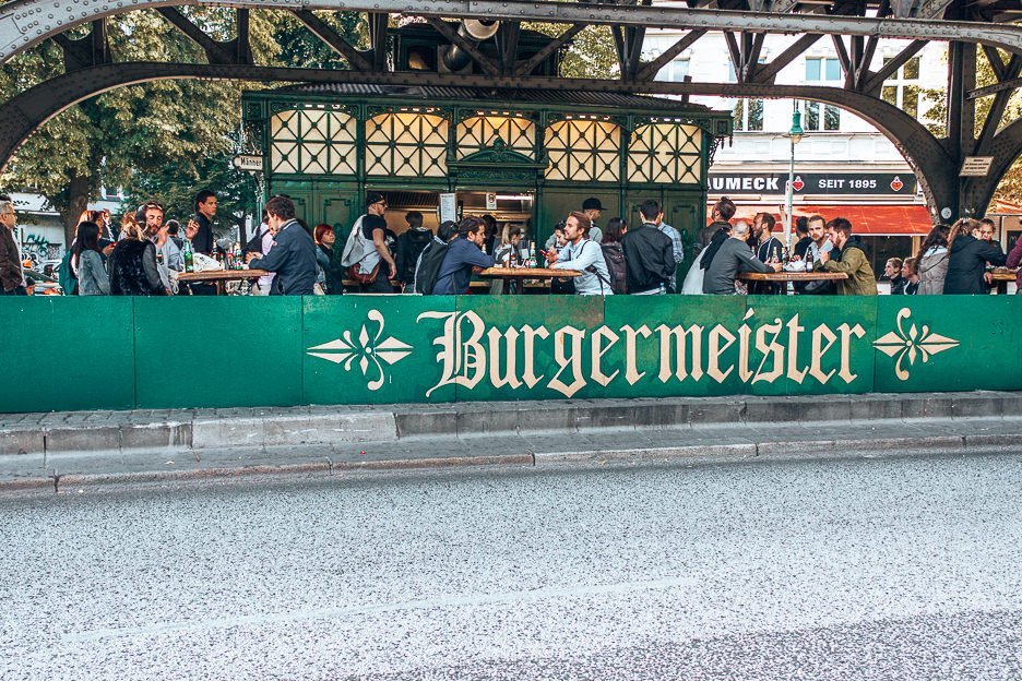 People eating burgers at Burgermeister, Berlin