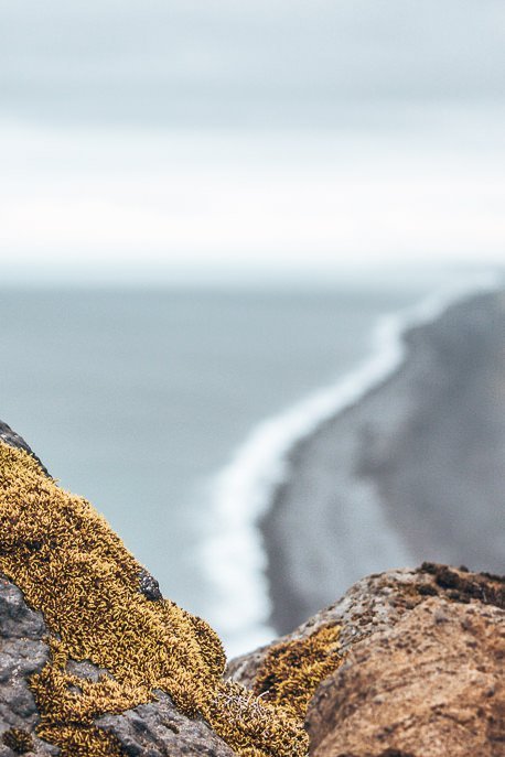 Through My Lens A Summer Adventure Through Iceland 10 P Peering through the rocks at the black beaches, Iceland