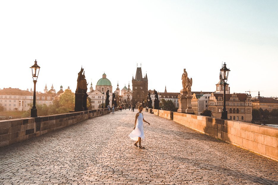 Jasmine twirling on the Charles Bridge in the early morning