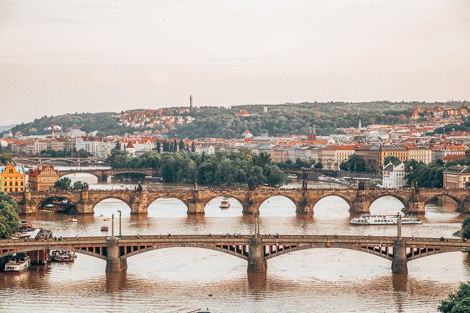 What To Pack For A European Road Trip 2 L View over Prague at sunset, Czech Republic