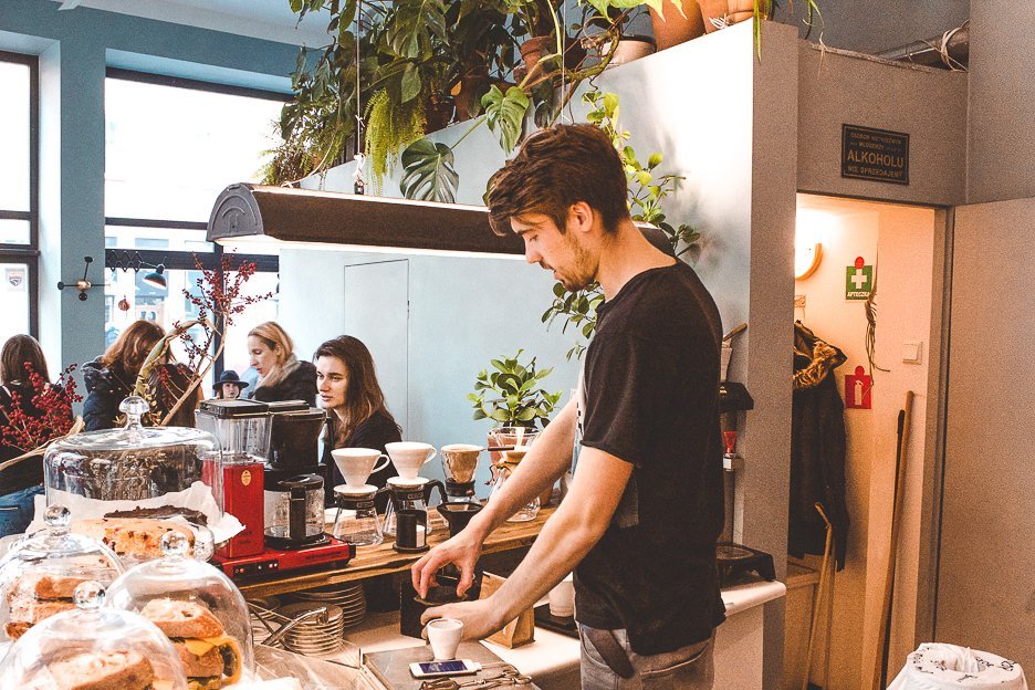 A barista prepares coffee in STOR cafe, Warsaw, Poland