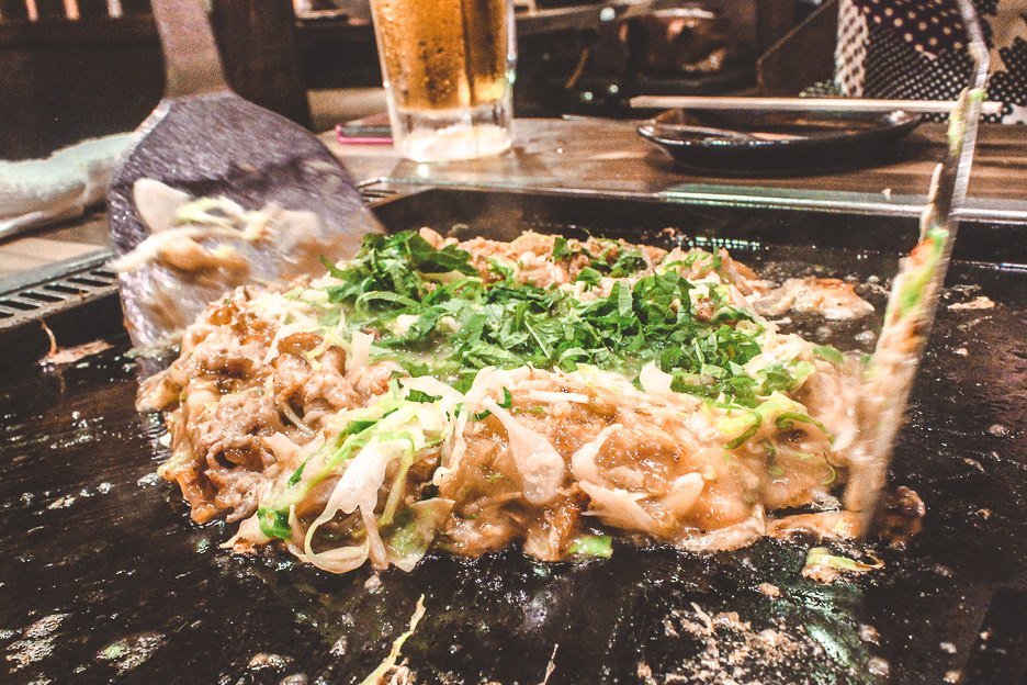 Okonomiyaki on the grill | Coolest food in Japan