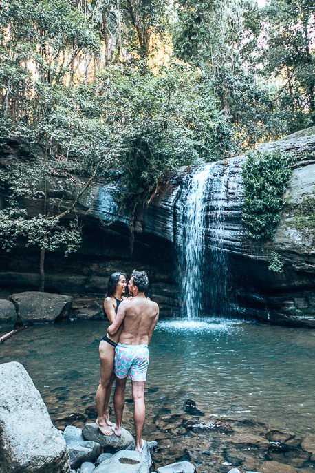 A couple at Buderim Falls, waterfalls near Brisbane, Queensland