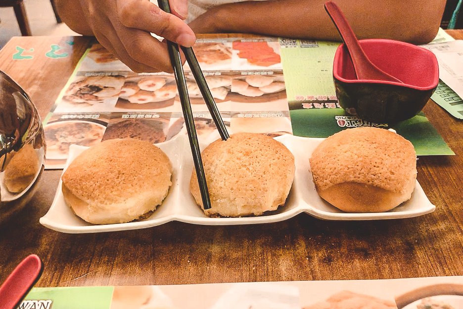 How To Spend 4 Days In Hong Kong 18 L Baked BBQ pork buns at Tim Ho Wan - must-try food in your 4 day Hong Kong itinerary