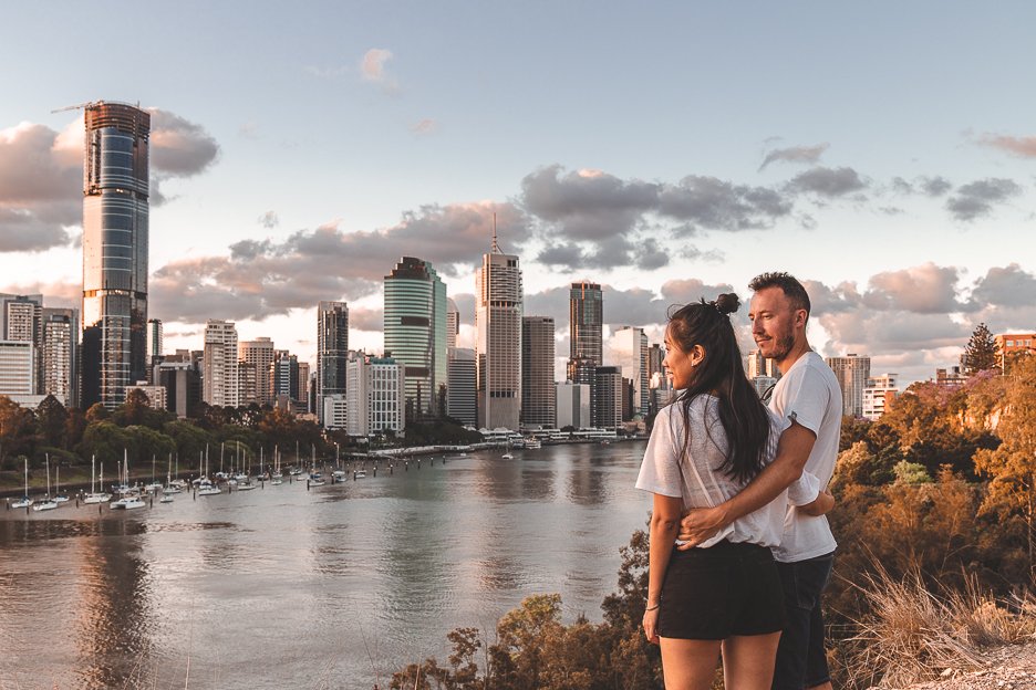 A couple taking in the view of Brisbane CBD from Kangaroo Point Cliffs