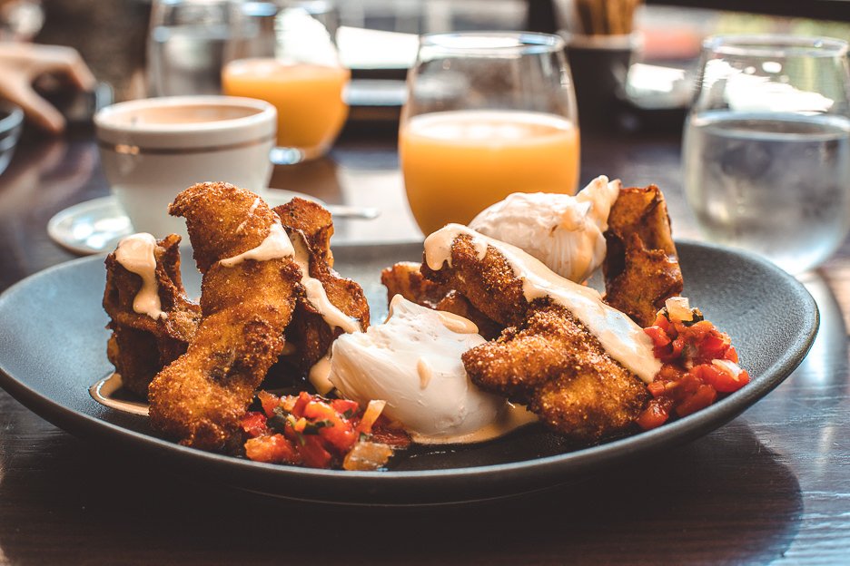 Hotel Review Next Hotel Brisbane 5 L Chicken waffles with poached eggs - breakfast at Lennons Restaurant and Bar