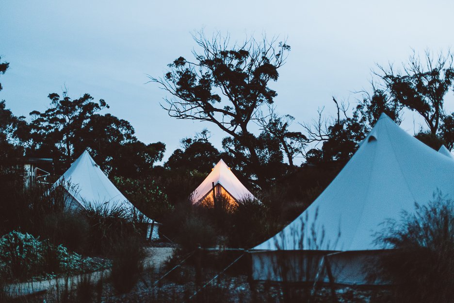 Bay of Fires Bush Retreat 8 L the Bell Tents at dusk at Bay of Fires Bush Retreat