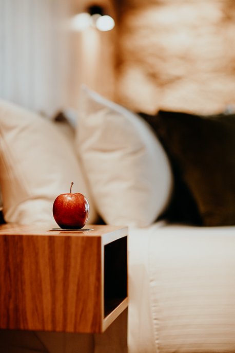 Red apple on night stand at Moss Hotel