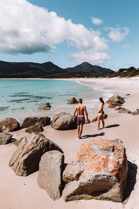 Tasmania Itinerary 31 P Enjoying the sand and sunshine down at Wineglass Bay Beach, Freycinet National Park